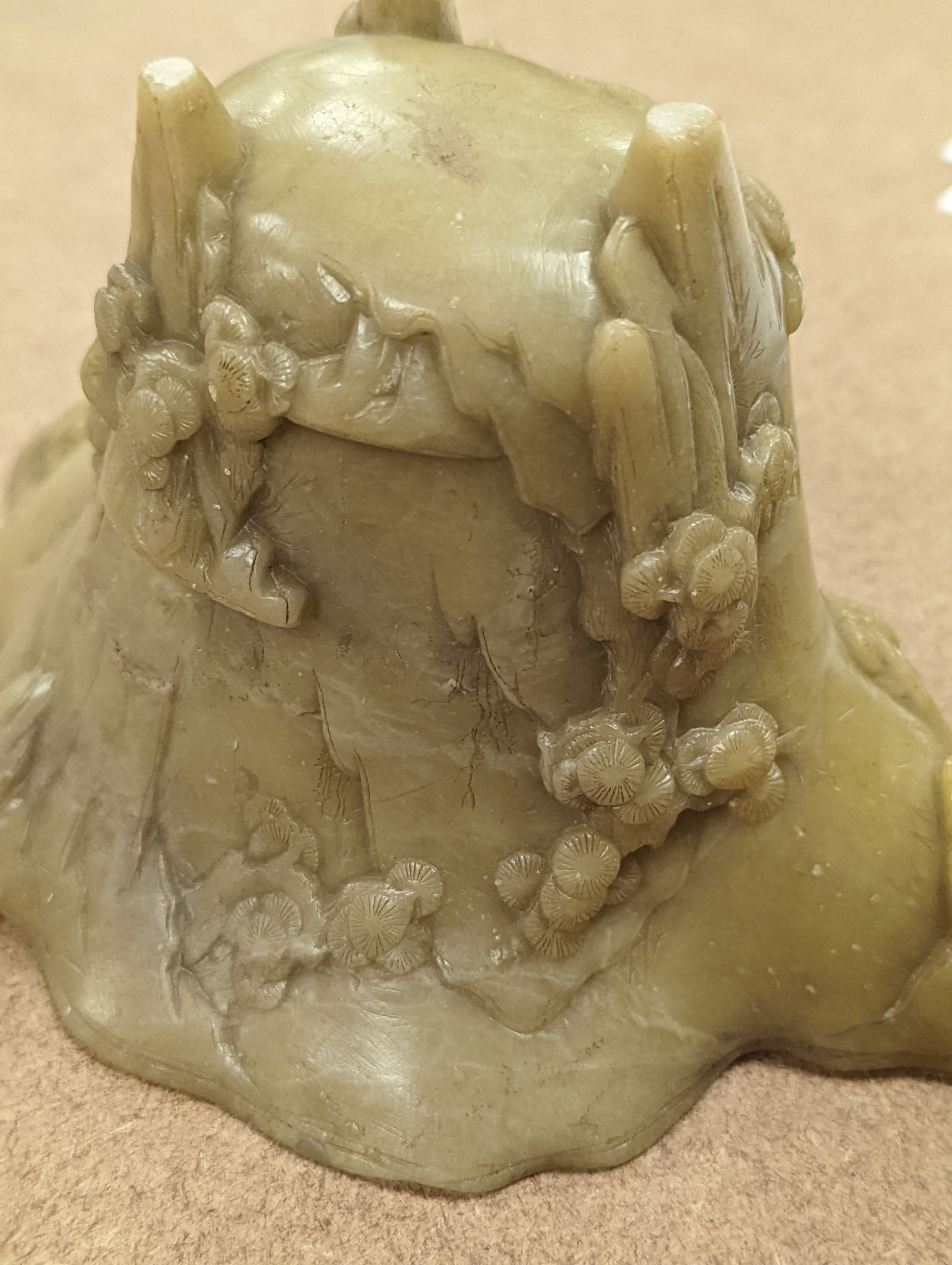 A Chinese carved soapstone libation cup, 19cm